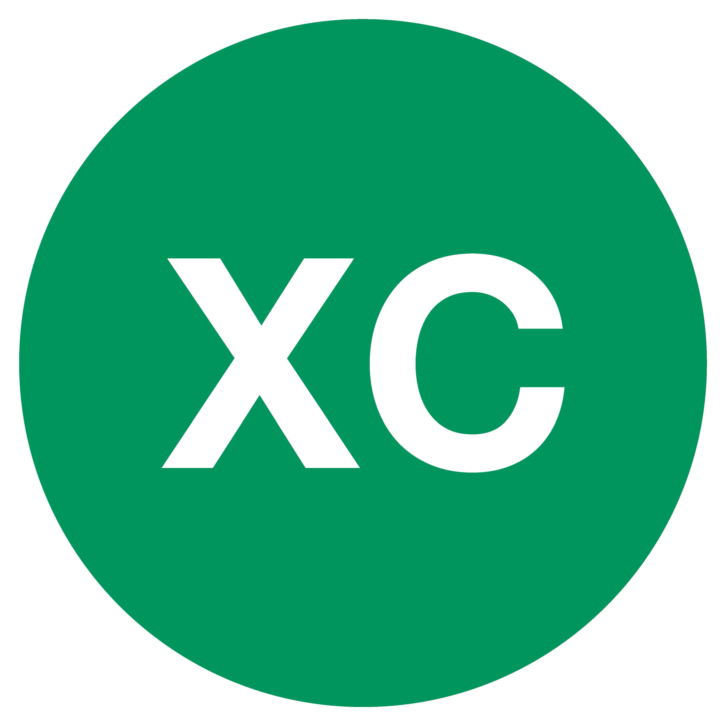 Green circle technical mountain bike signage with white XC letters in the middle.