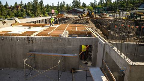 Construction zone at Ber Mountain with new concrete walls and wood decking.