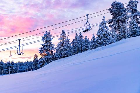 Sunset view on a snowy mountain top