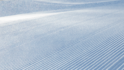 close up photo shot of corduroy snow texture