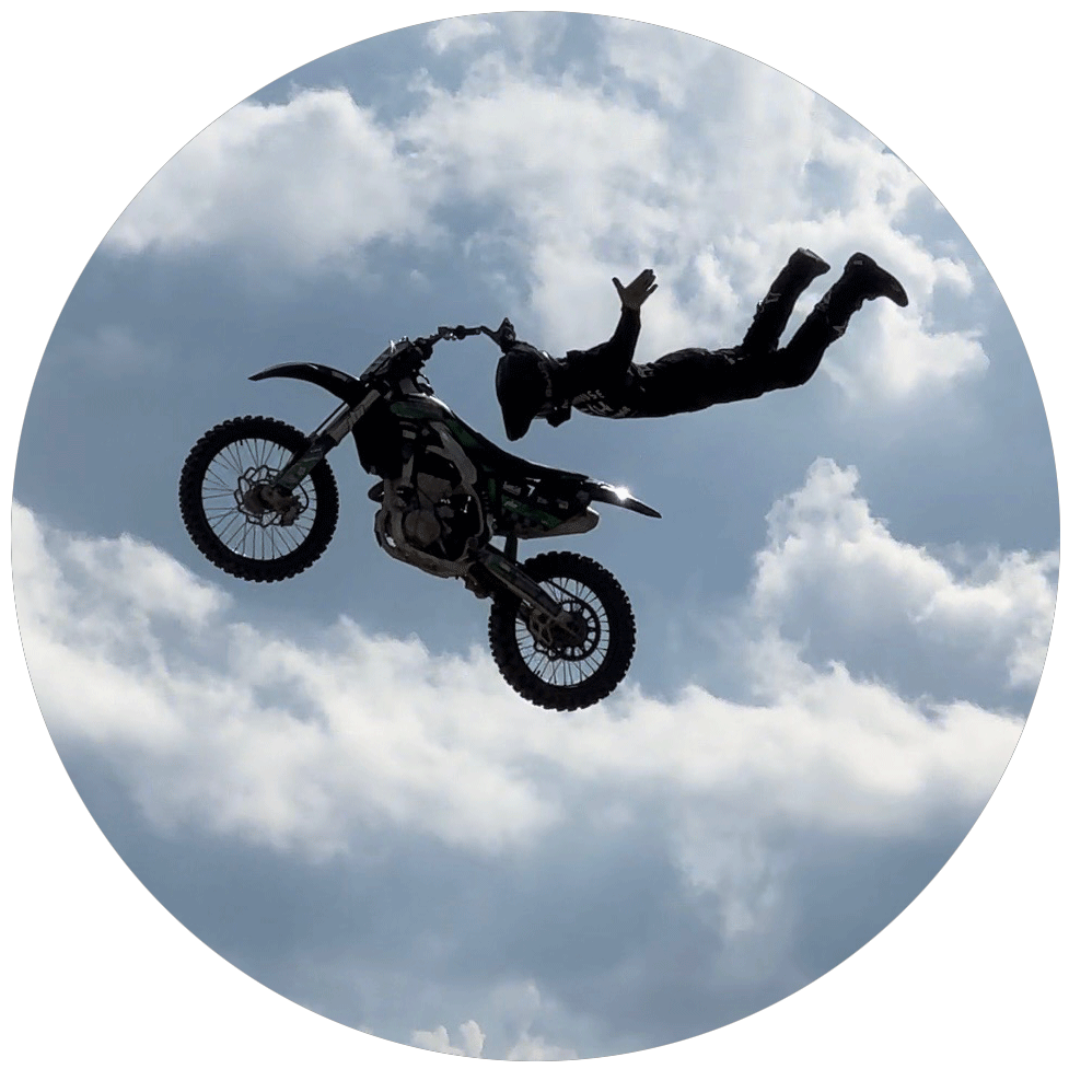 Ripper Ray doing a trick in the air with his motorcycle