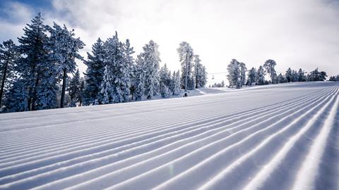 A freshly groomed winter trail at Snow Summit and the close up shot of the corduroy groomed run.
