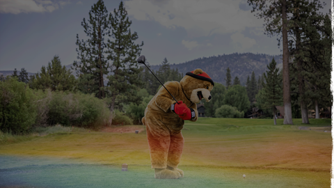 biggie the bear golfing at bear mountain golf course in the summertime