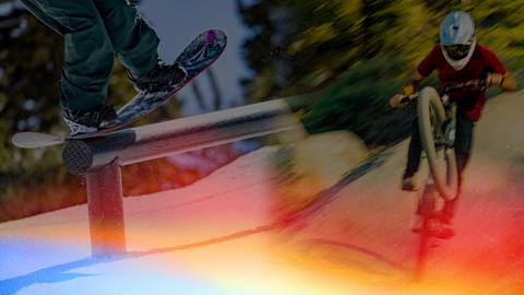 Mountain biker and snowboard in same phoot