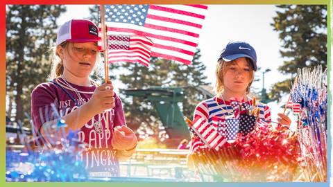 Two kiddos enjoying Fourth of July festivities 