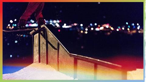 Snowboarder on a rail during a Snow Summit Night Session