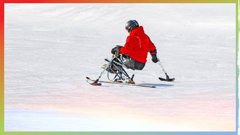 adaptive skier in the snow
