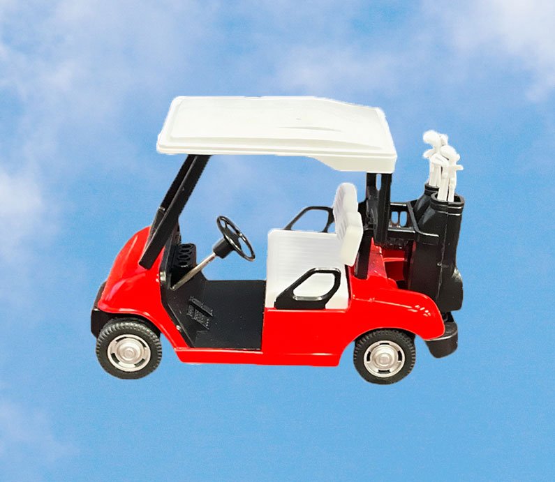 A pull back rolling golf cart toy with a red body, white top, and black replica golf bags on the back on the cart.