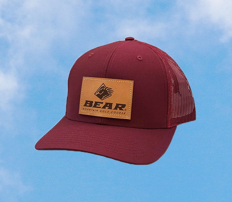 Cardinal trucker had with bear mountain logo on a leather patch on the front.