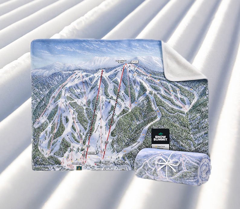 A blanket with Snow Summit's winter trail map on one side, with an opposing blank white side.
