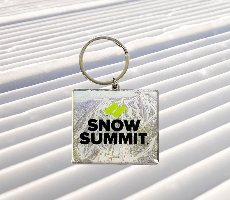 Snow Summit winter trail maps keychain with winter map in background and Snow Summit logo overlay in black and green.