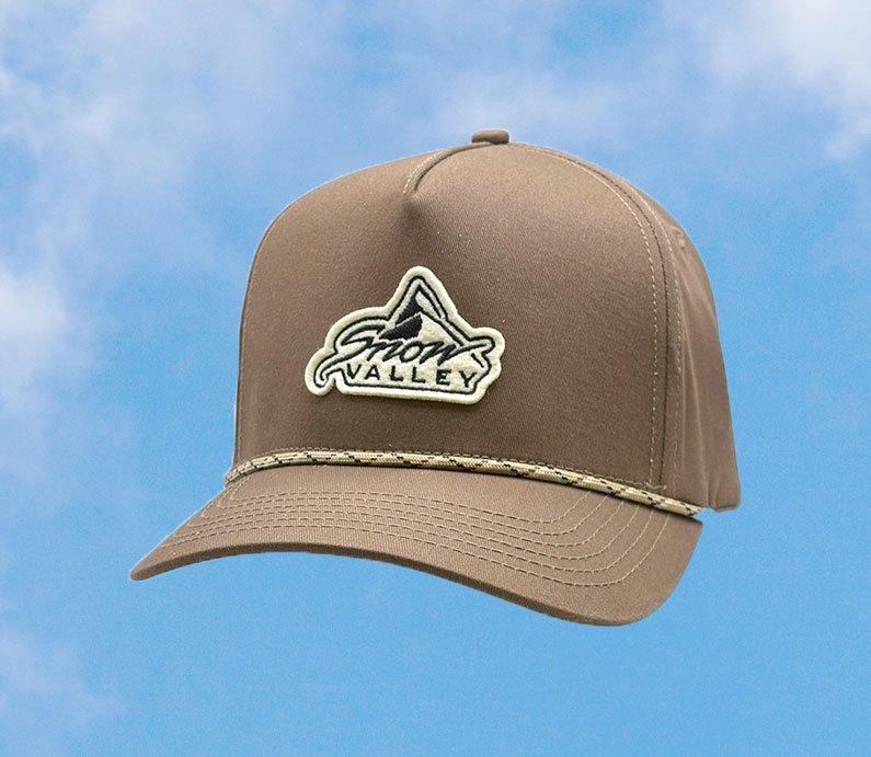 Beige brown color hat with Snow Valley logo iron on fabric patch and rope on the bill.