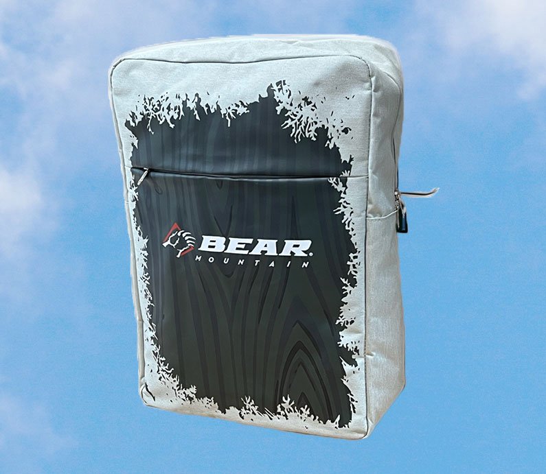 Dark backpack with frosted white design, multiple compartments, and Bear Mountain logo.