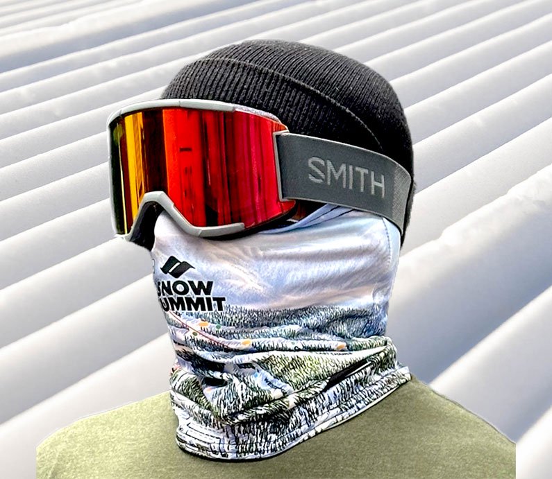 Head shot of rider in a black beanie, Smith goggles, and a Snow Summit trail map neck tube
