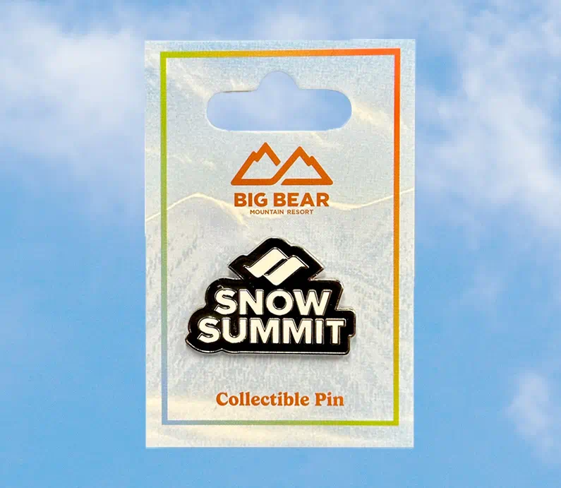 Collectible Snow Summit logo pin in black and white