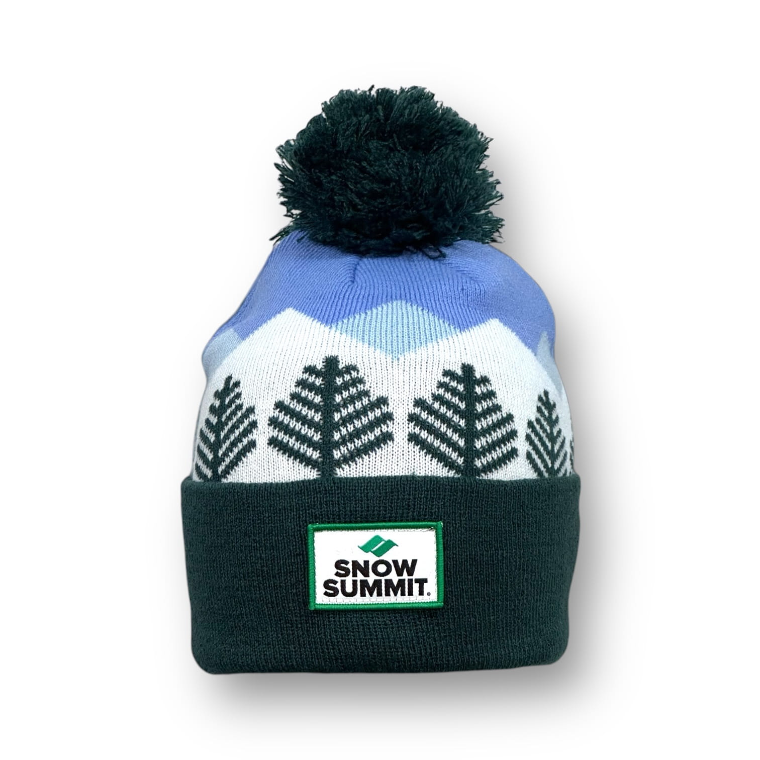 Beanie portraying stitching of trees and a blue stitched sky with snow summit logo patch on cuff of beanie and dark green pom pom on top.