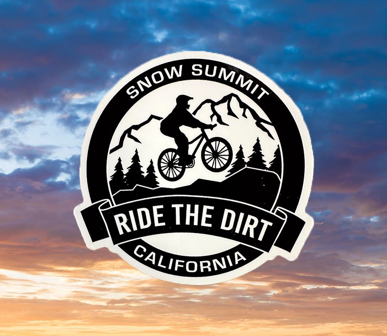 Snow Summit CA Ride the Dirt black and white sticker with a mountain biker on trail lined with trees and mountain design