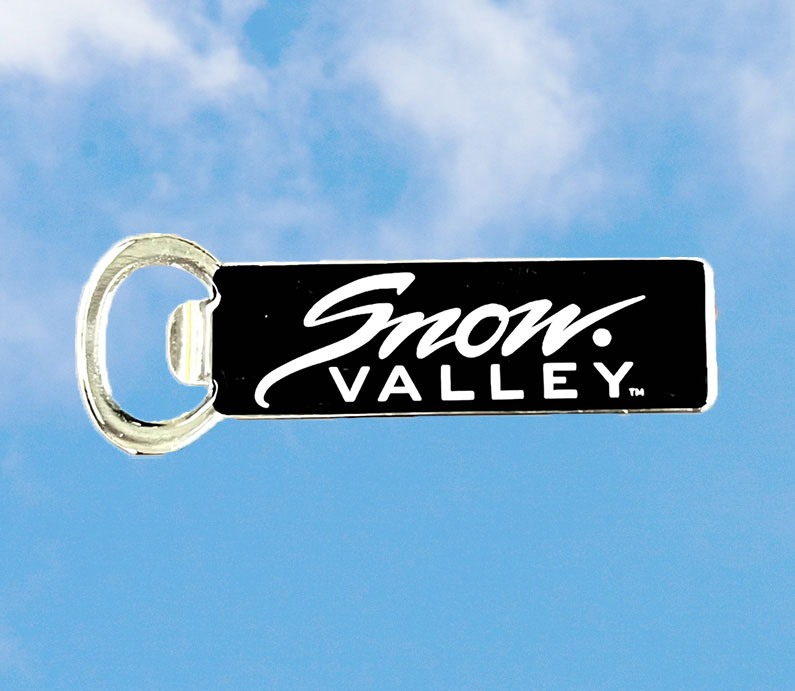 A black color Snow Valley magnet bottle opener.