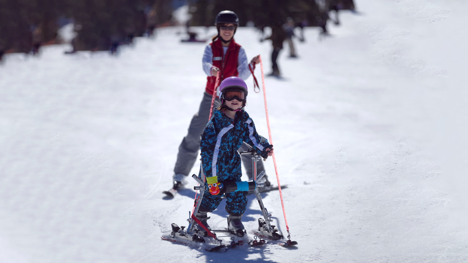 USARC program with our young adaptive skier standing and their guide