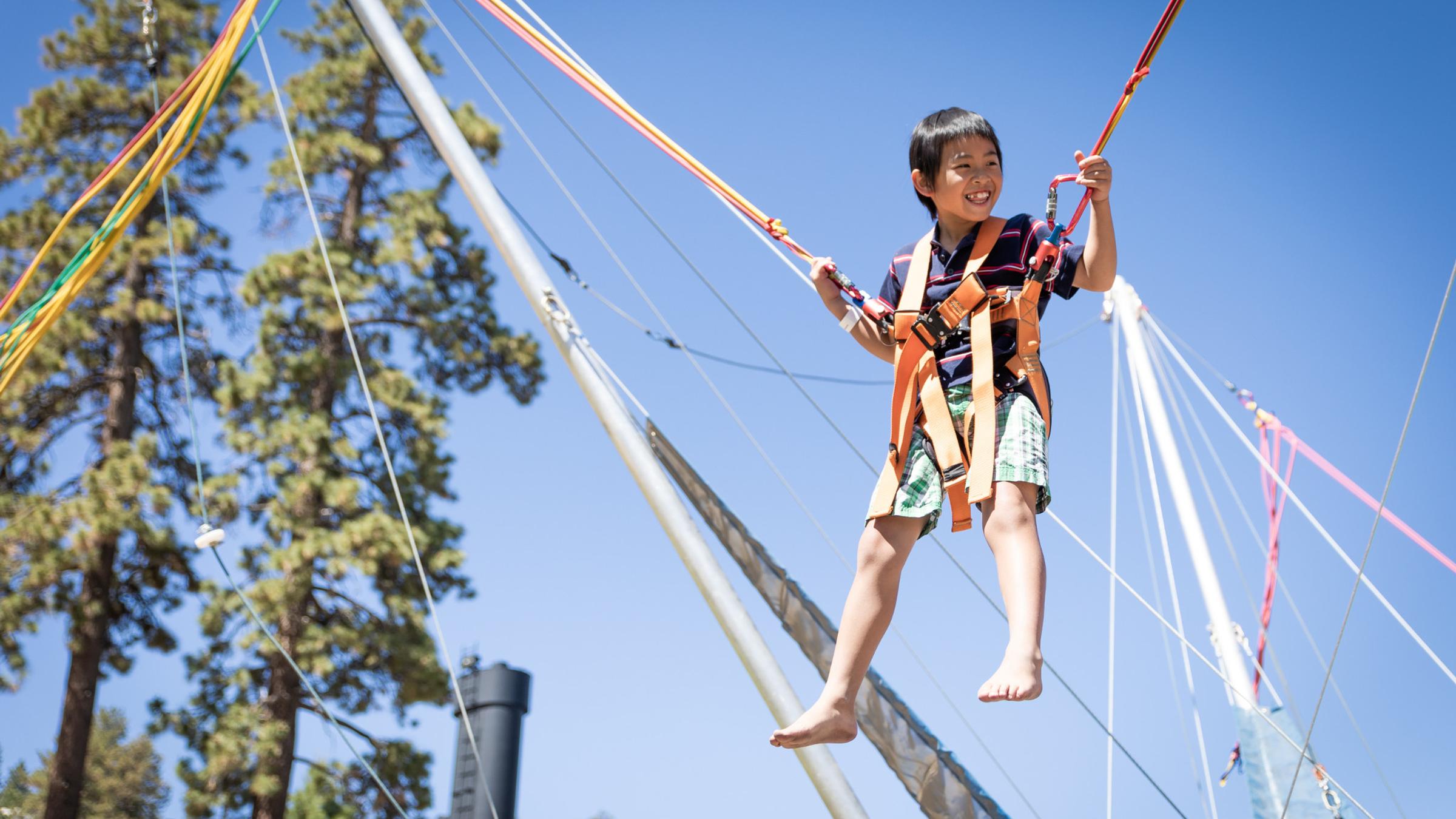 Child on Euro-Jump trampoline smiling