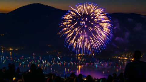 fireworks blast over big bear lake in the evening
