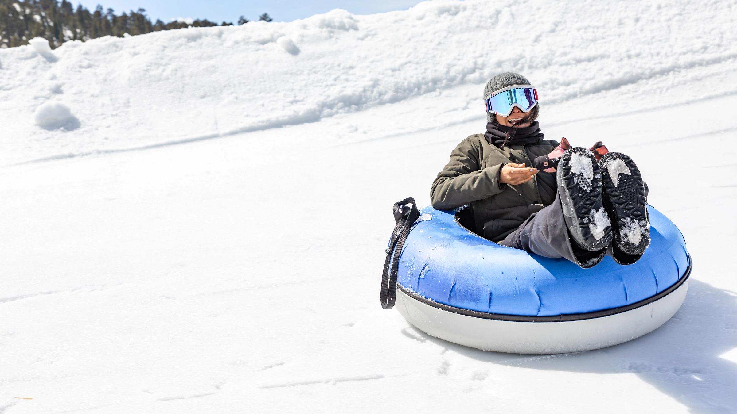 Person on a snow tube