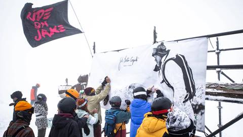 Guests signing a banner for a day for jake