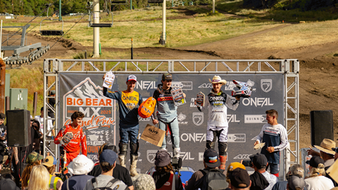 Motocross category winners on the podium at Bear Mountain during award ceremonies.