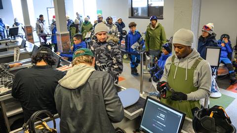 Snow Summit Ski & Snowboard Rental shop line of customers and employees at the counter