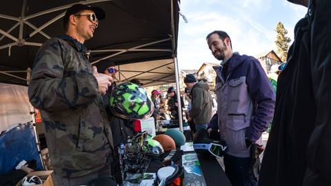 A Smith representative educating Snow Summit skier and snowboarders on the advantages of their Smith helmets during a Ski Safety Day winter event.