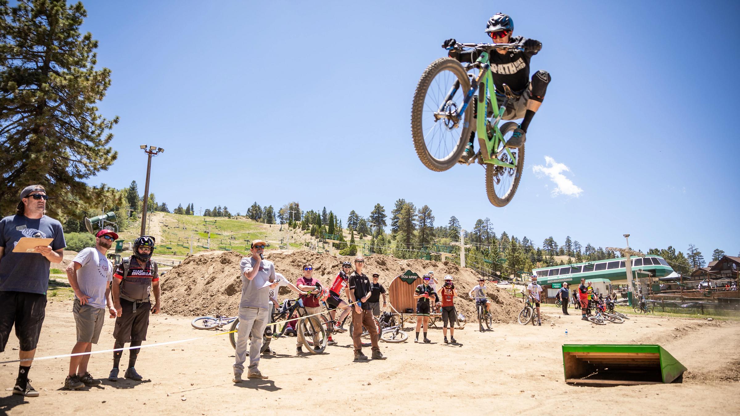 Mountain biker participating in a long jump competition