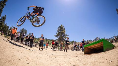 Dual slalom race two mountain bikers