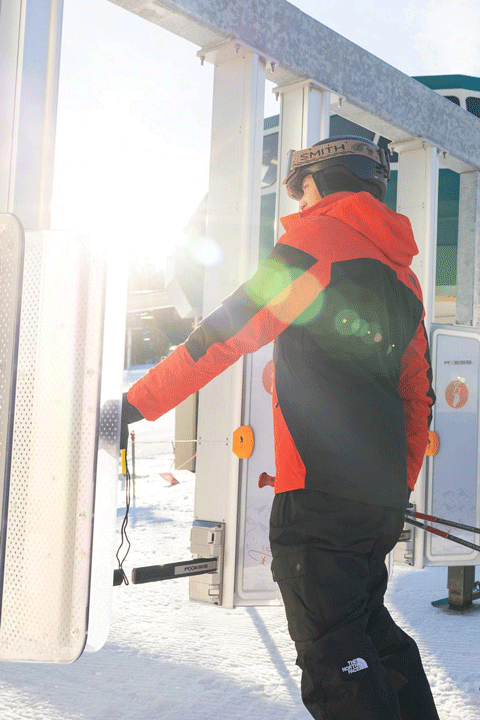 Skier going through an RFID gate to get to the chairlifts at Snow Summit