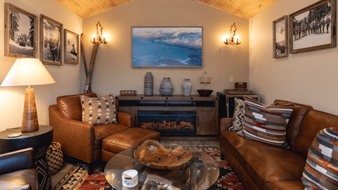 Ikon Pass Suite view of the couch, TV, fridge and more, now available for skiers to reserve