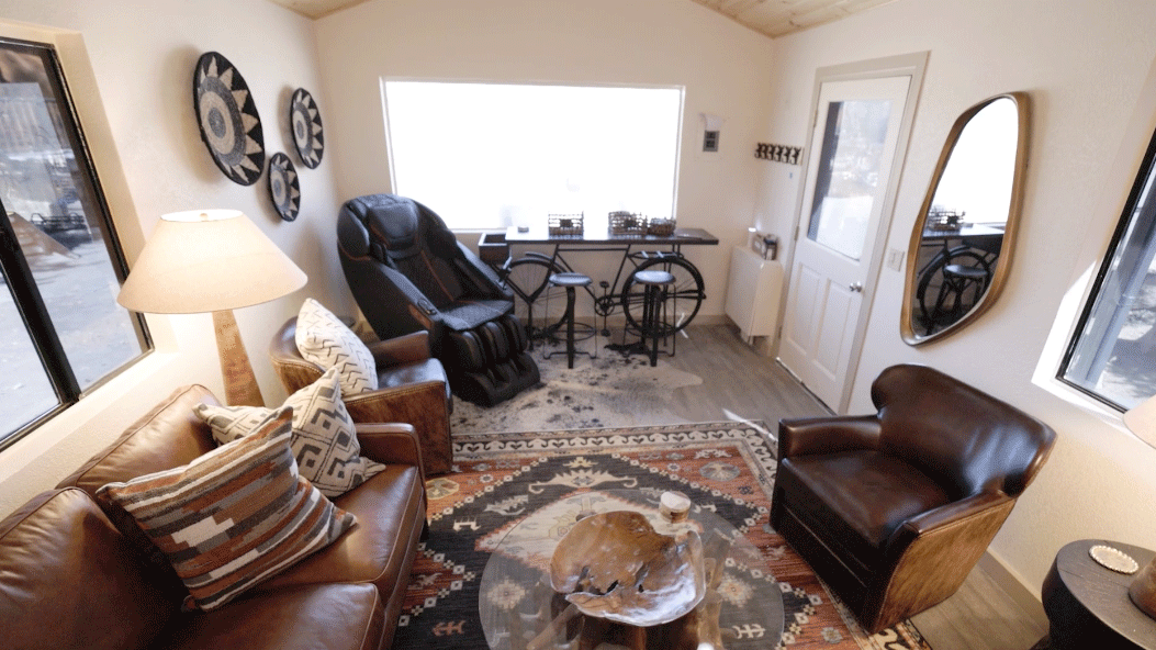 Ikon Pass Suite view of the massage chair, couch, and more, now available for skiers to reserve