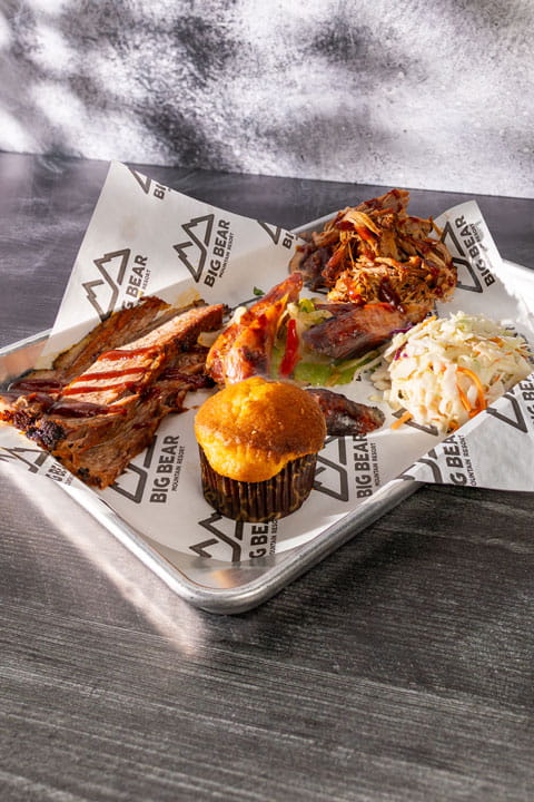 Plate with bbq, corn bread, cole slaw