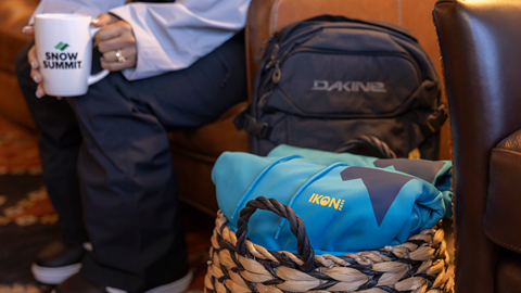 Basket filled with Ikon Pass blankets in the Ikon Pass Suite at Snow Summit