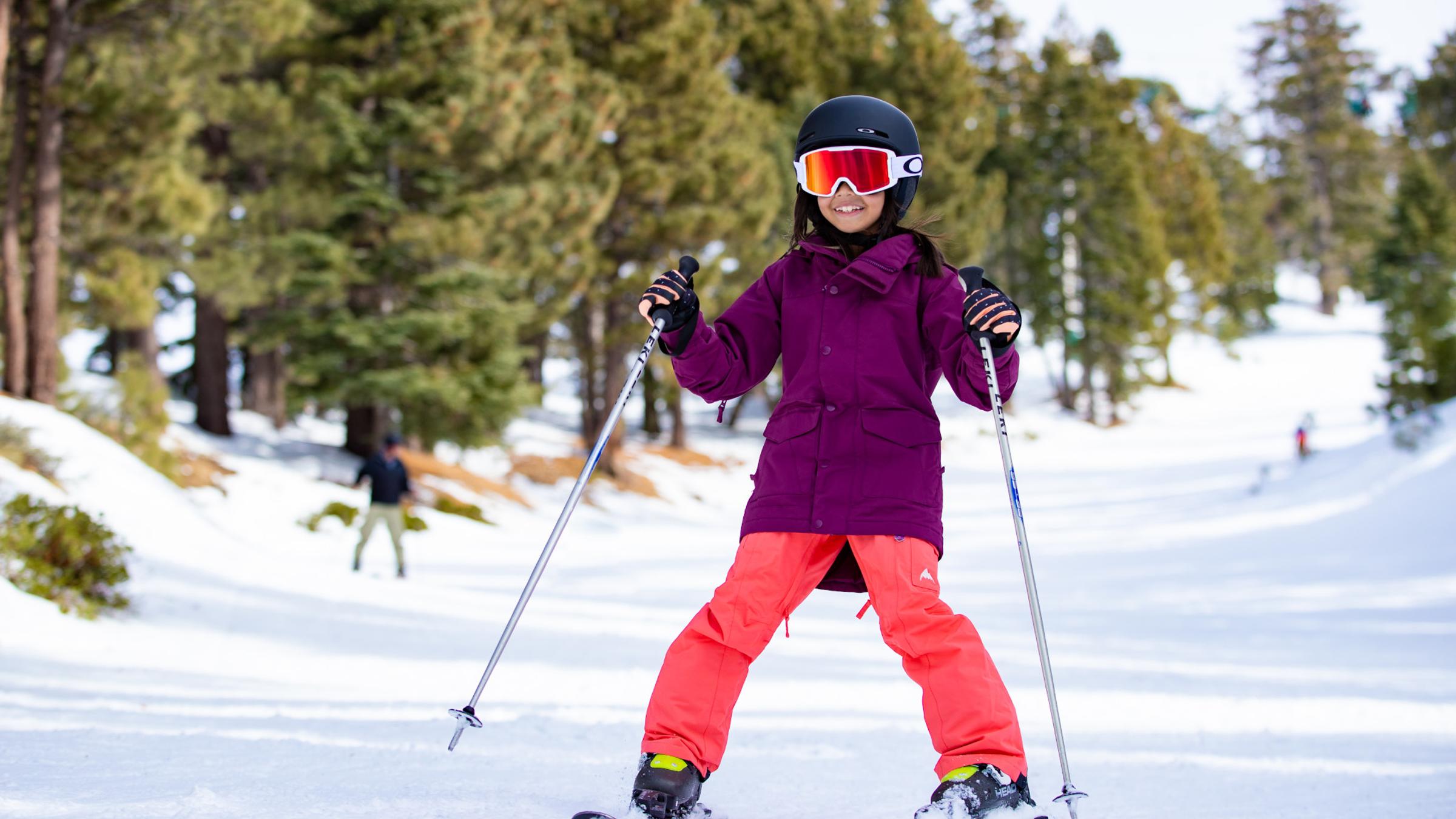 girl skiing down the slopes
