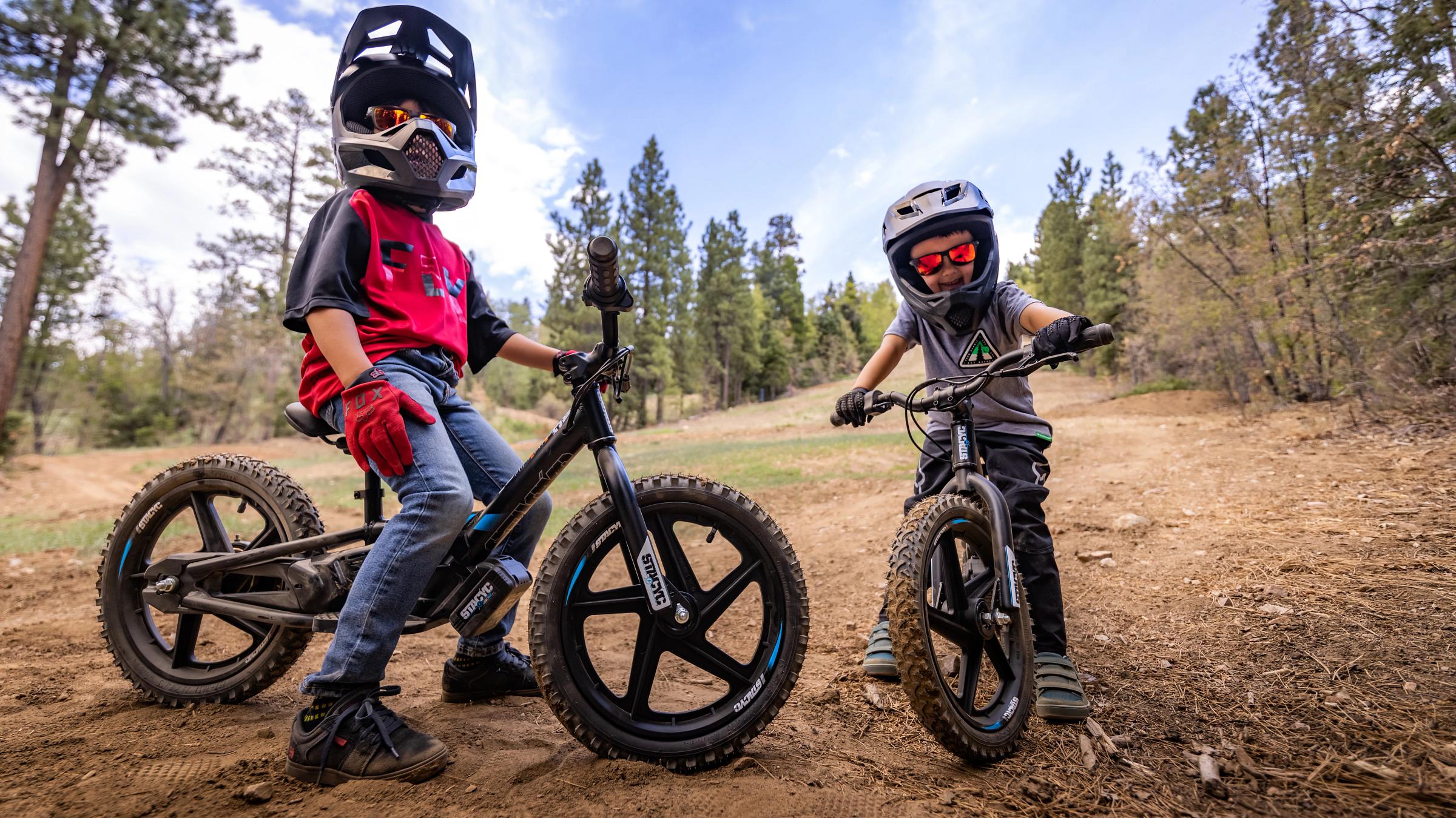 Two kids on ebikes.