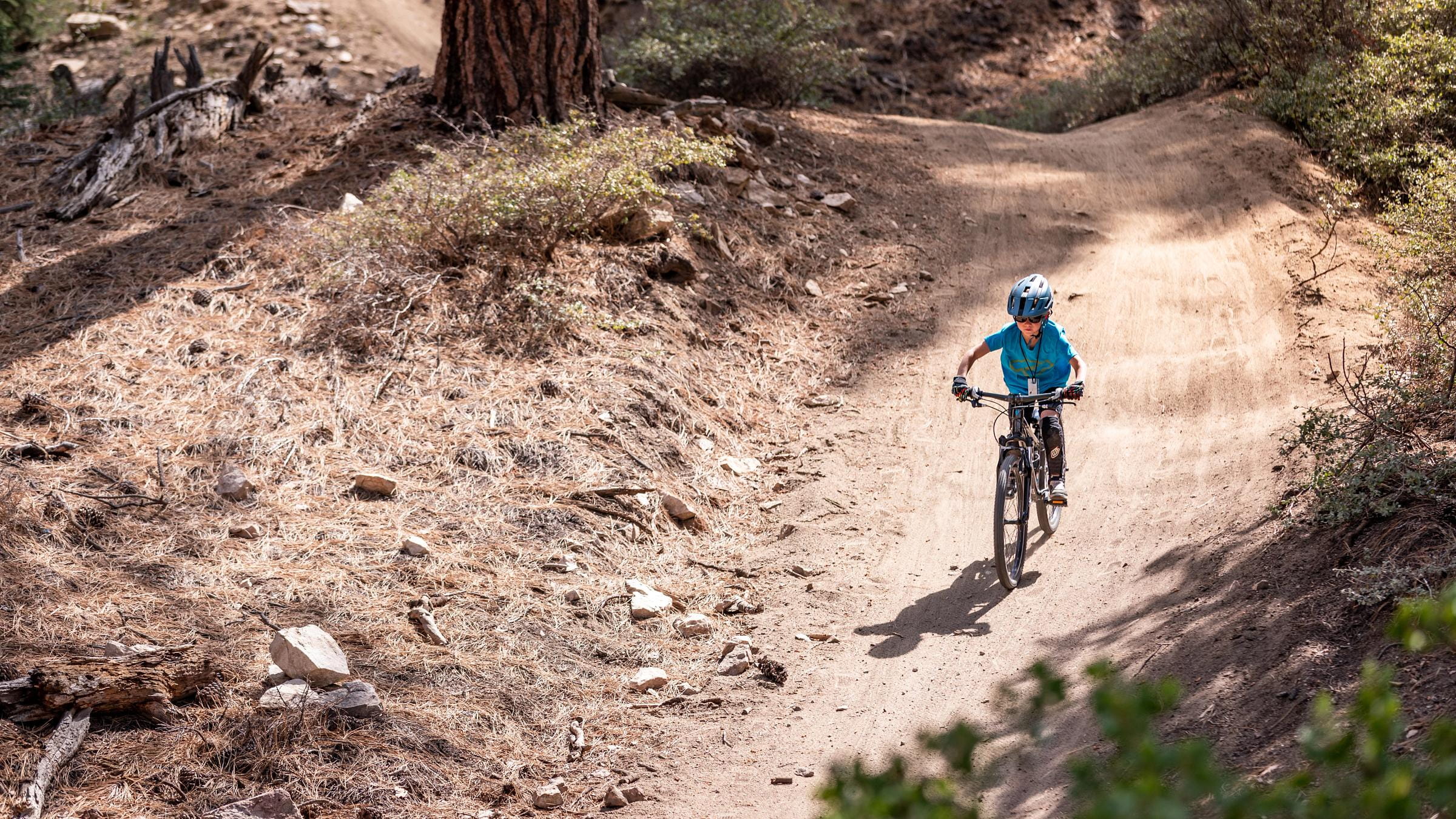 Child on a MTB going downhill