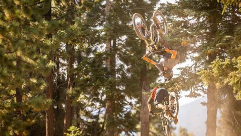 Rider on a MTB doing a backflip trick