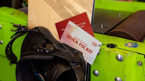 BBMR Winter Quick Fix Kit wax card lying on top of a snowboard