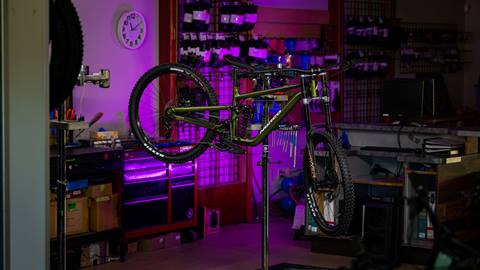 Norco Shore mountain bike hanging on a rack
