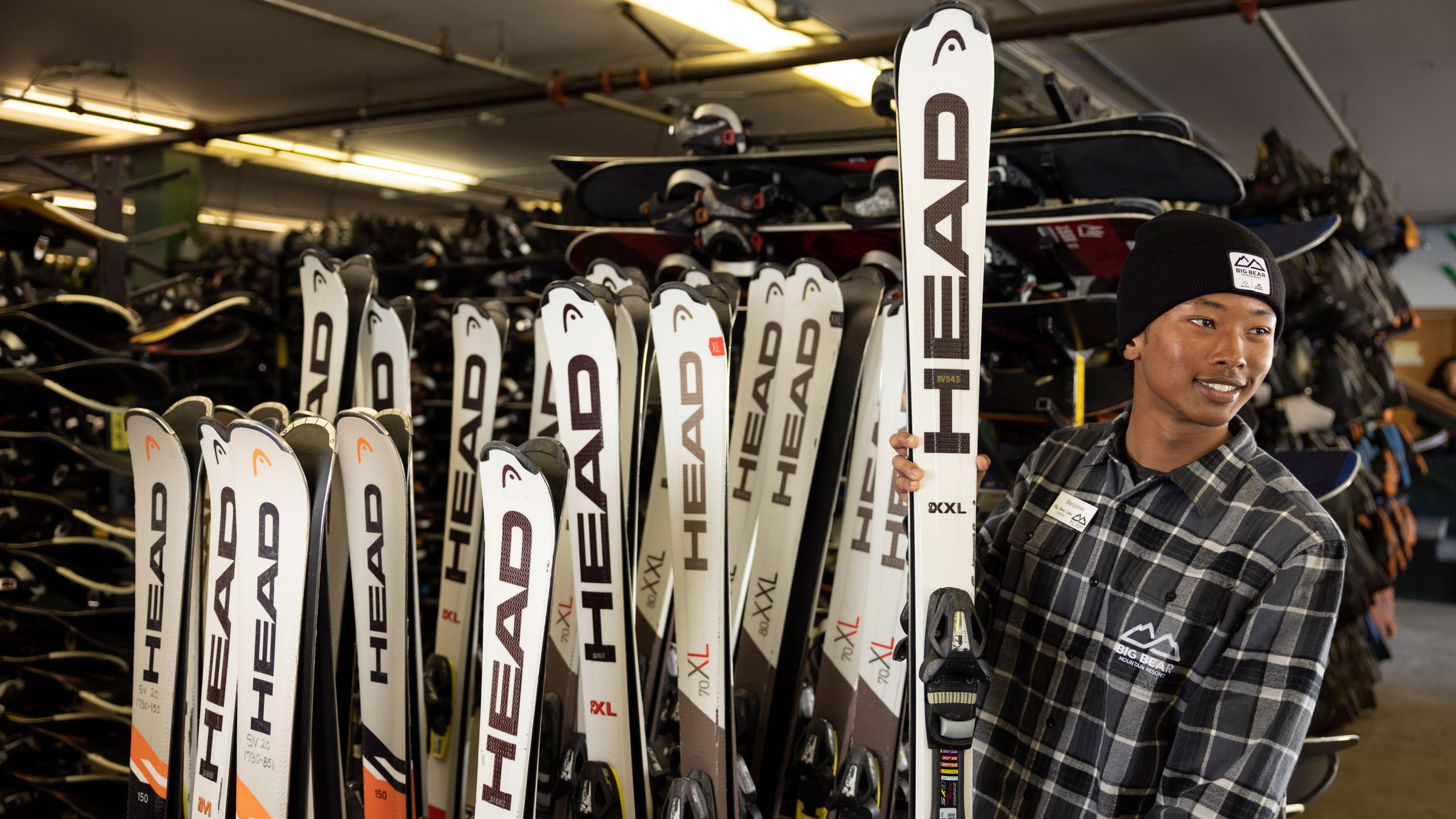 BBMR employee grabbing ski rentals for a guest