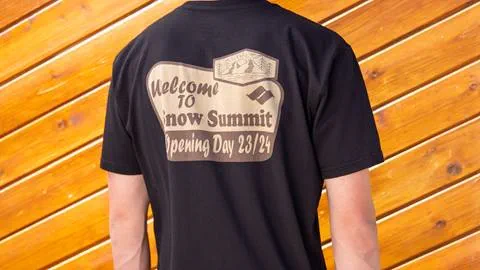 Black shirt with a brown and tan logo that says welcome to snow summit, opening day 23/24