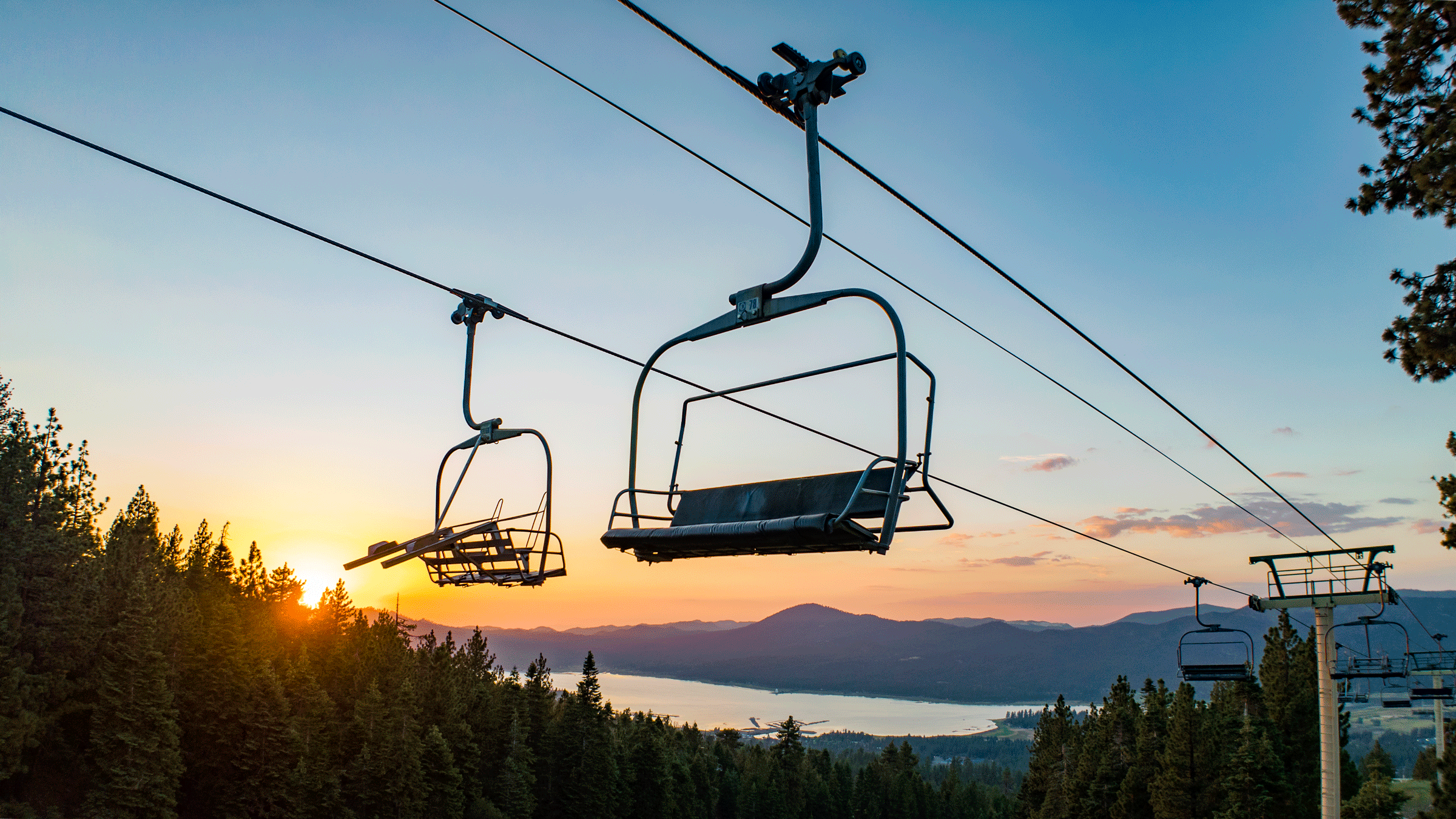 Sunset views of Big Bear Lake from top of Snow Summit's chairlift ride in the summer