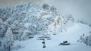 Snowy ski resort chairlifts