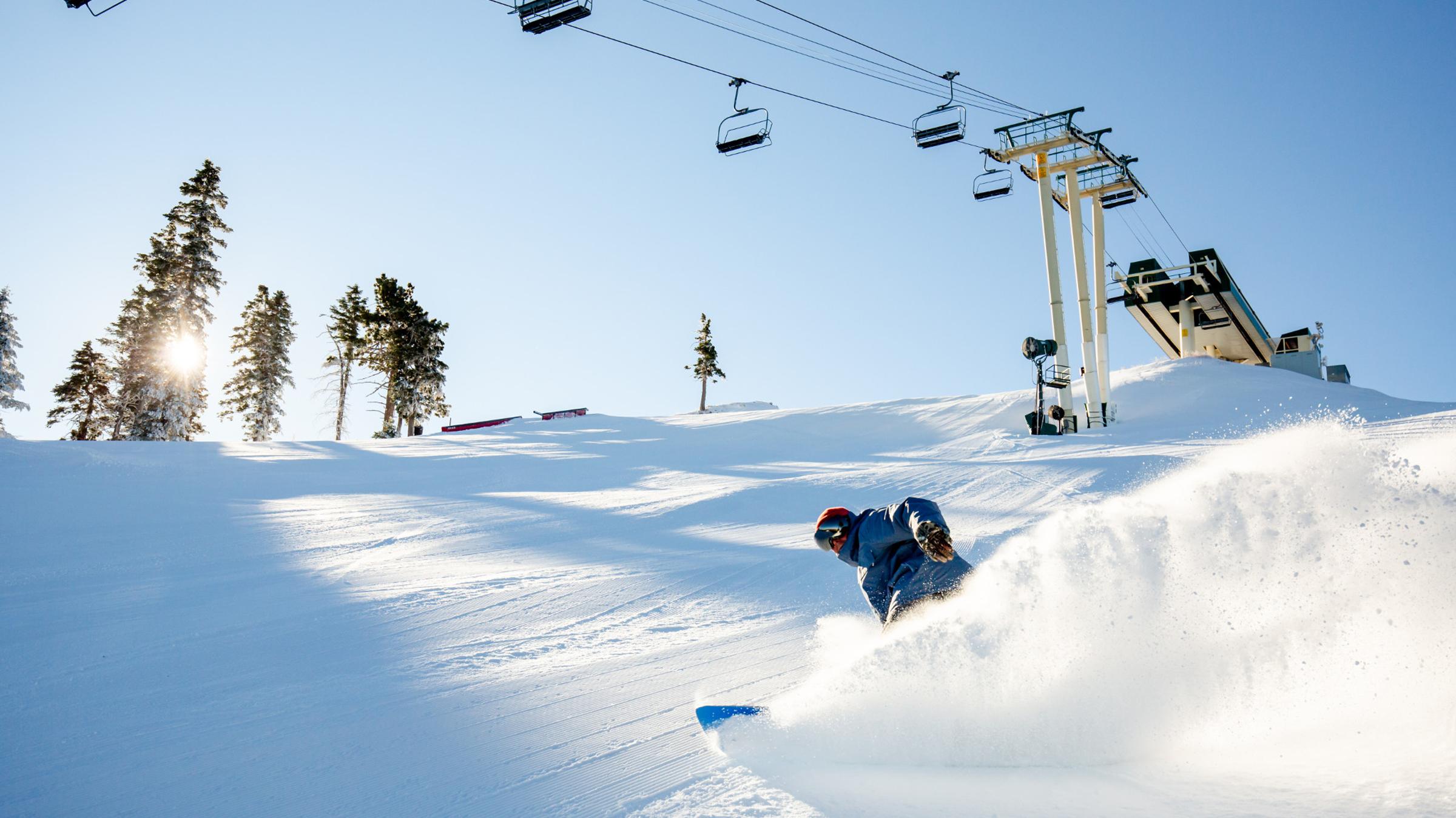 Snowboarder shredding in fresh powder