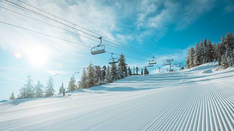 Snow Valley blue bird day with freshly groomed corduroy trail