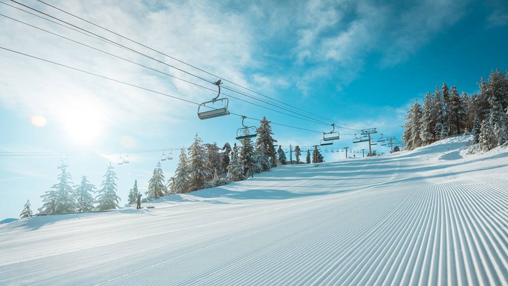 Snow Valley blue bird day with freshly groomed corduroy trail
